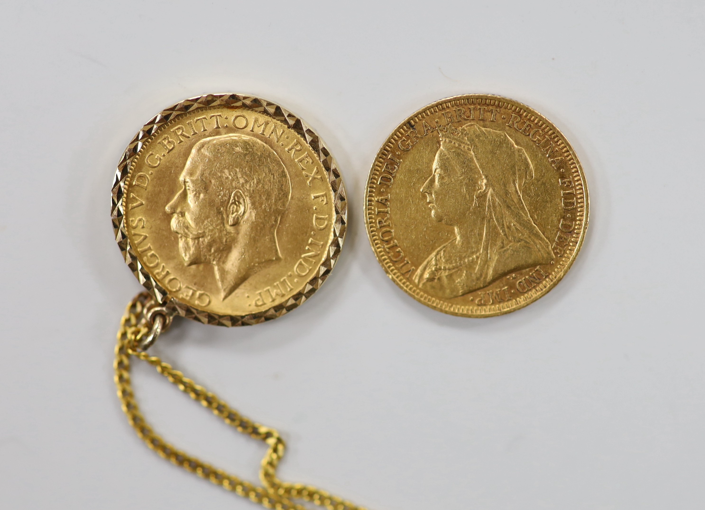 A Victorian 1893 gold sovereign and a 1913 god sovereign in a later 9ct gold pendant mount, on a 9ct chain, gross weight 11.3 grams.